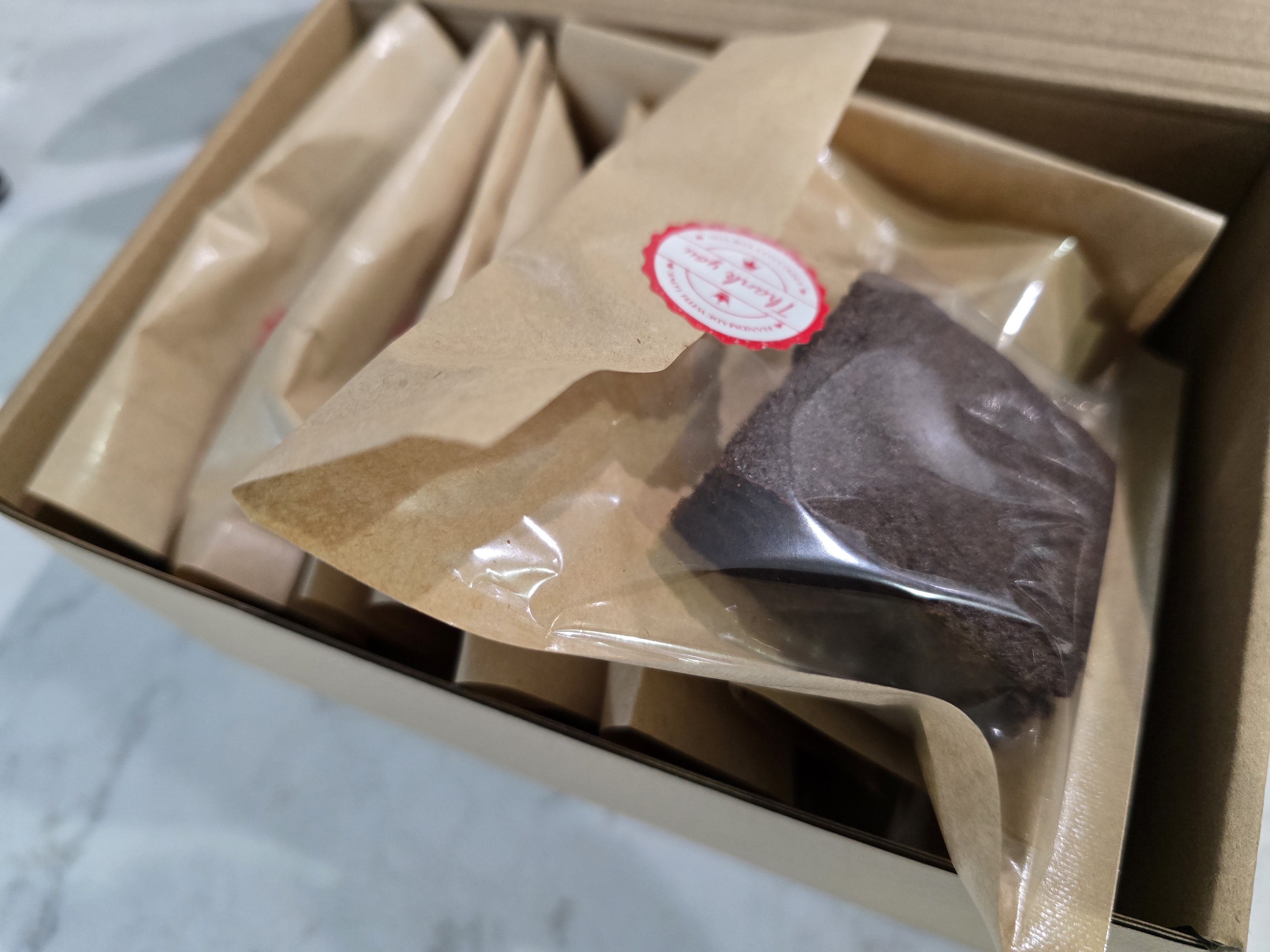 Open mystery box with baked goods
